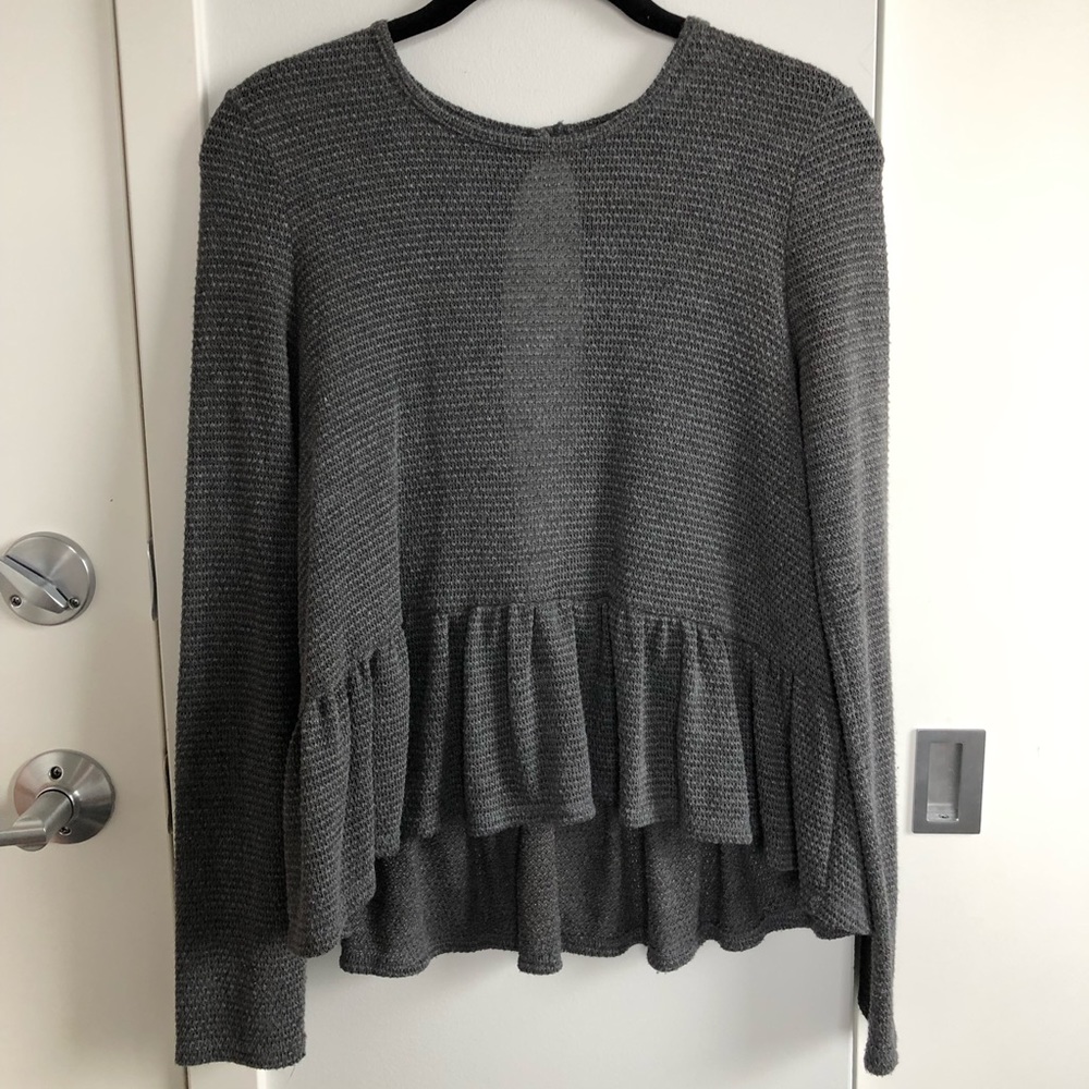 Peplum gray long sleeved top